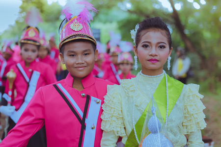 KANCHANABURI THAILAND - JULY 18 :  Parade on street, in athletic game opening day of primary student in the rain on July 18,2018 at Nongthabong School in Kanchanaburi, Thailandのeditorial素材