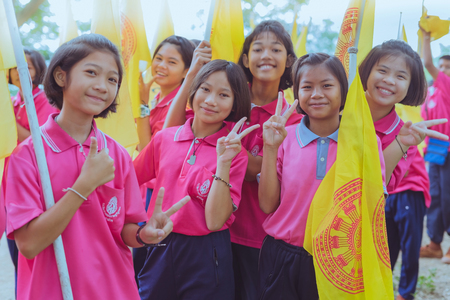 KANCHANABURI THAILAND - JULY 18 :  Parade on street, in athletic game opening day of primary student in the rain on July 18,2018 at Nongthabong School in Kanchanaburi, Thailandのeditorial素材