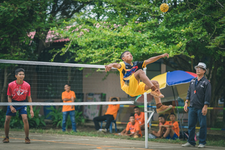KANCHANABURI THAILAND - JULY 18 :   Unidentified students playing traditional asian sport game sepak takraw on July 18,2018 at Nongthabong School in Kanchanaburi, Thailandのeditorial素材
