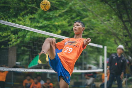 KANCHANABURI THAILAND - JULY 18 :   Unidentified students playing traditional asian sport game sepak takraw on July 18,2018 at Nongthabong School in Kanchanaburi, Thailandのeditorial素材