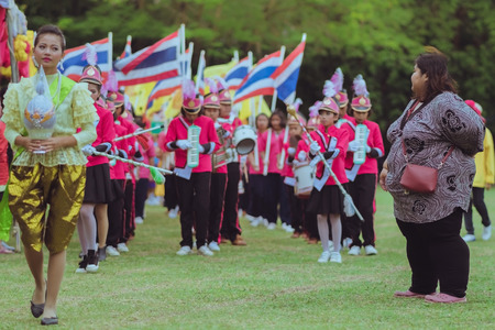 KANCHANABURI THAILAND - JULY 18 :  Parade on street, in athletic game opening day of primary student in the rain on July 18,2018 at Nongthabong School in Kanchanaburi, Thailandのeditorial素材