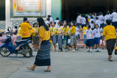 KANCHANABURI THAILAND - JULY 26 : Thai students in candle parade, Buddhist lent candle festival on July 26,2018 at Watkrangthongratburana school in Kanchanaburi, Thailandのeditorial素材