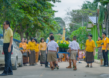 KANCHANABURI THAILAND - JULY 26 : Thai students in candle parade, Buddhist lent candle festival on July 26,2018 at Watkrangthongratburana school in Kanchanaburi, Thailandのeditorial素材