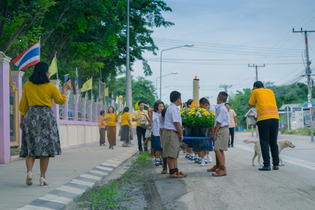 KANCHANABURI THAILAND - JULY 26 : Thai students in candle parade, Buddhist lent candle festival on July 26,2018 at Watkrangthongratburana school in Kanchanaburi, Thailandのeditorial素材