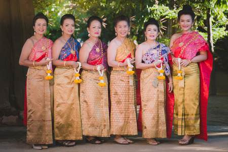 KANCHANABURI THAILAND - SEPTEMBER 28 :   Unidentified female teacher take a photo before Thai dance show on stage on September 28,2018 at Watkrangthongratburana school in Kanchanaburi, Thailandのeditorial素材