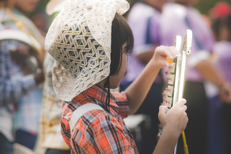 Students play glockenspiel in the parade at the sports opening ceremonyのeditorial素材