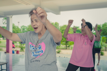 KANCHANABURI THAILAND - MAY 22 : Unidentified Teachers and students aerobic exercise in the afternoon before go back home on May 22,2018 at Watkrangthongratburana school in Kanchanaburi, Thailandのeditorial素材
