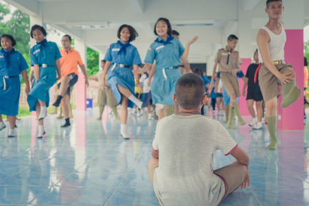 KANCHANABURI THAILAND - MAY 22 : Unidentified Teachers and students aerobic exercise in the afternoon before go back home on May 22,2018 at Watkrangthongratburana school in Kanchanaburi, Thailandのeditorial素材