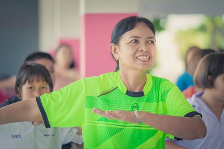 KANCHANABURI THAILAND - MAY 24 : Unidentified Teachers and students aerobic exercise in the afternoon before go back home on May 24,2018 at Watkrangthongratburana school in Kanchanaburi, Thailandのeditorial素材