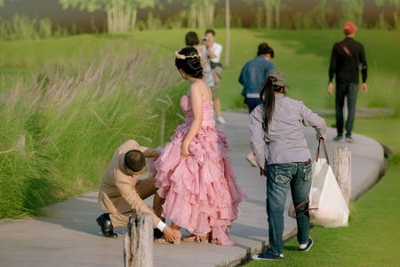 The groom and the bride wait for the pre-wedding photography.の写真素材