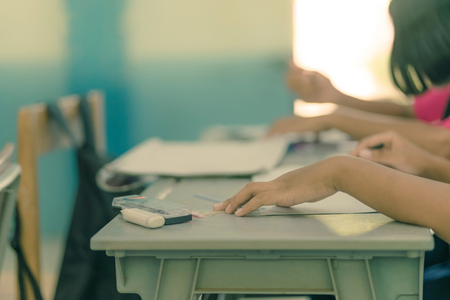 Students try to drawing a basic pattern Thailand with a pencil in classroomの写真素材