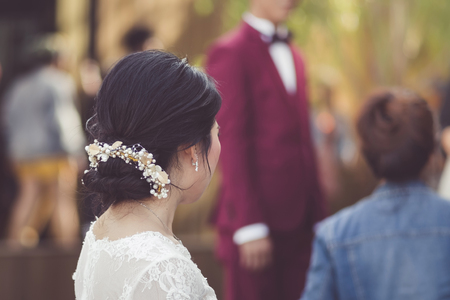 The groom and the bride wait for the pre-wedding photography.の写真素材
