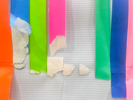 Colored paper strips decorate on board