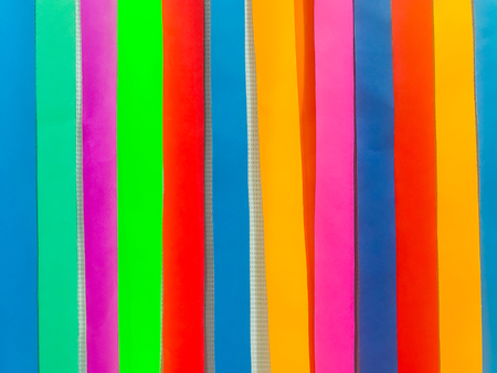 Colored paper strips decorate on boardの写真素材