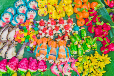 Colorful of deletable Imitation Fruits. (Kanom Look Choup), A traditional Thai dessert or snack for sale in thai market.の写真素材