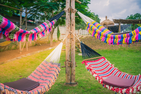 Colorful of handmade hammock.  Pattern Background, these handmade nets are comfortable for outdoor relaxingの写真素材