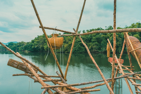 Ancient bamboo fish trap equipment of countryside, Thailandの写真素材