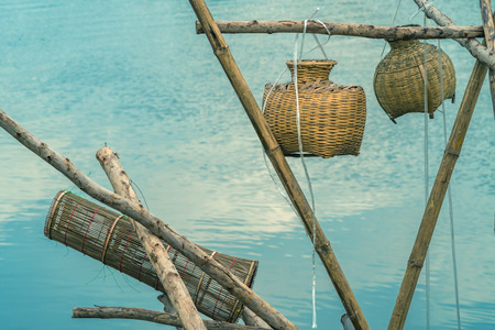 Ancient bamboo fish trap equipment of countryside, Thailandの写真素材