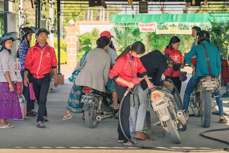 BAGAN-Myanmar, January 21, 2019 : Unidentified Peoples on motorcycles waiting in line for refuel at gas station on january 21,2019 in Bagan, Myanmar.のeditorial素材