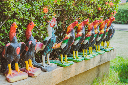 Colorful of many rooster statues at King Naresuan Monument in Kanchanaburi, Thailand.の写真素材