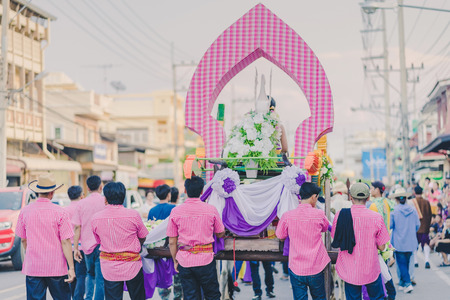 Happiness  villagers dressed in beautiful local costumes join the parade to celebrate Songkran Festival at Ban Nong Khao in Kanchanaburi, Thailand.のeditorial素材