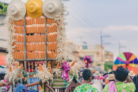 Happiness  villagers dressed in beautiful local costumes join the parade to celebrate Songkran Festival at Ban Nong Khao in Kanchanaburi, Thailand.のeditorial素材