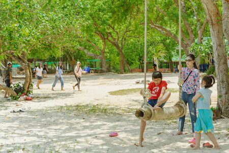 CHON BURI THAILAND - APRIL 19 : Unidentified tourists relax and swim at the beach of  Samae San...
