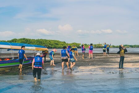 CHANTHABURI, THAILAND: APRIL 15, 2019 Unidentified Tourists travel by raft boats to relax on the tombolo part of the sea on april 15,2019 at Bang Chan (The No-Land Village), Chanthaburi, Thailandのeditorial素材