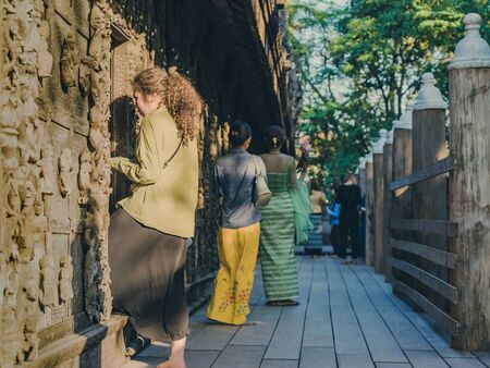 MANDALAY-Myanmar, January 19, 2019 : Unidentified tourists come to visit and take photographs at...