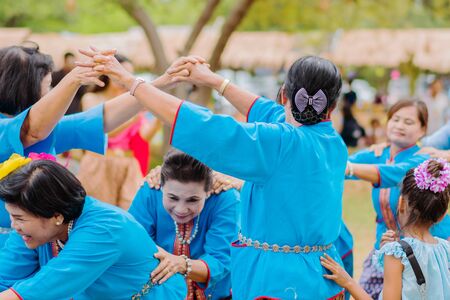 KANCHANABURI, THAILAND - August 12 : Thai culture%u2019s Play "Ri Ri Khao San" playing by trying to catching the last one in the line on street show at local market on august 12,2019 in Kanchanaburi,Thailand.のeditorial素材
