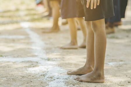 Students fitness training for sprinting on an athletic track in school.の写真素材