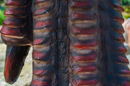 Close up to Colorful and patterns of  dinosaur model surfaces created with cement