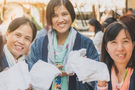LAMPHUN THAILAND - DECEMBER 12 :  Unidentified Thai female tourists learn to make tie-dye clothes on December12,2019 at Karen village in Lamphun, Thailandのeditorial素材