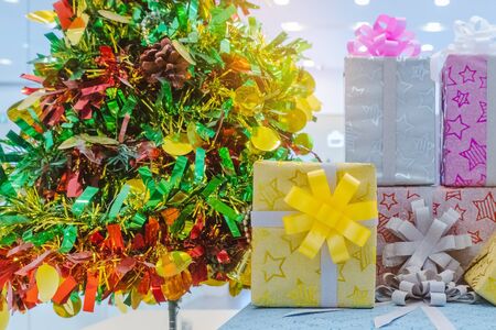 Beautiful various gifts boxes or presents in different size and shape with ribbon on table in the partyの写真素材