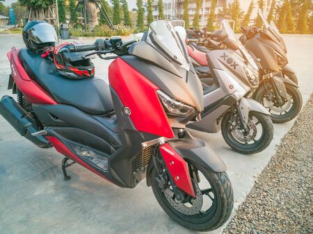 KANCHANABURI, THAILAND - JANUARY 12, 2020 : Yamaha X-Max gang were parking in the line for meeting and gathering after touring together at the gas station on january 12, 2020 in Kanchanaburi,Thailand.のeditorial素材