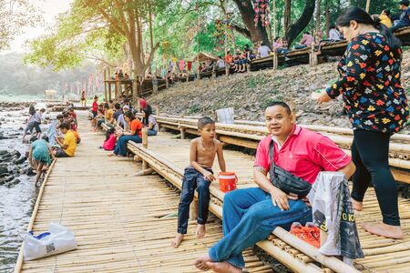 RATCHABURI THAILAND-JANUARY 19, 2020 : Unidentified people come to visit, relax and swim in the stream at Ohpoi Market on january 19, 2020 in Ratchaburi Thailand.のeditorial素材