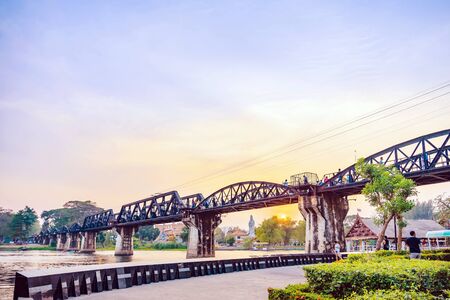 KANCHANABURI,THAILAND-FEBRUARY 9,2019 : Unidentified tourists came to visit and take a pictures before sunset at The Bridge Over the River Kwai on February 9,2019 in Kanchanaburi,Thailandのeditorial素材