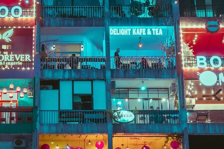Ho Chi Minh City, Vietnam - April 24, 2019 : The Cafe apartment at night is a new tourist attraction...