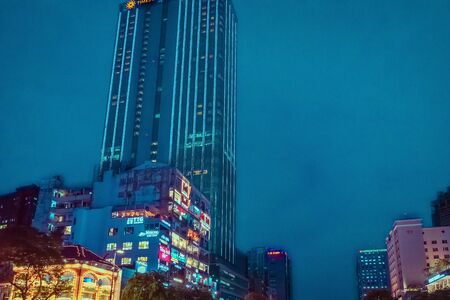 Ho Chi Minh City, Vietnam - April 24, 2019 : The Cafe apartment at night is a new tourist attraction at the city center on April 24, 2019 in Ho Chi Minh City, Vietnam.のeditorial素材