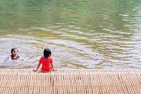RATCHABURI THAILAND-JANUARY 19,2020 : Unidentified people come to visit, relax and swim in the stream at Ohpoi Market on january19, 2020 in Ratchaburi Thailand.のeditorial素材