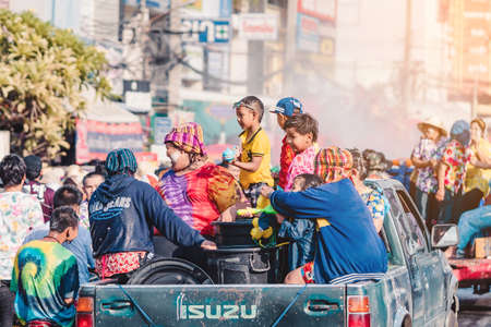 KANCHANABURI, THAILAND - APRIL 17, 2019: Unidentified people celebrating Songkran by throwing water to each other on road on April 17, 2019 in Kanchanaburi, Thailand.のeditorial素材