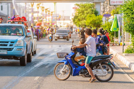 KANCHANABURI, THAILAND - APRIL 17,2019: Unidentified people celebrating Songkran by throwing water to each other on road on April 17, 2019 in Kanchanaburi, Thailand.のeditorial素材