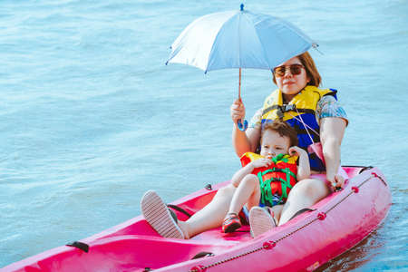 CHANTHABURI, THAILAND: APRIL 15, 2019 Unidentified Tourists travel by raft boats to relax and...