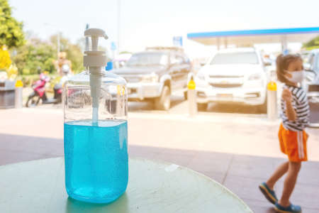 KANCHANABURI THAILAND - MARCH 22 : Coronavirus hand sanitizer gel to wash hands for flu virus prevention for serving customers in PTT gas staion on march 22,2020 in Kanchanaburi, Thailand.のeditorial素材