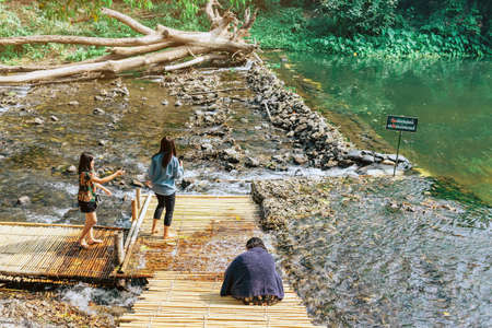 RATCHABURI THAILAND-JANUARY 19,2020 : Unidentified people come to visit, relax and swim in the stream at Ohpoi Market on january 19, 2020 in Ratchaburi Thailand.のeditorial素材