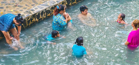 KANCHANABURI, THAILAND - JANUARY 1: Unidentified Asian tourists bathe and soak the body in warm mineral water for good health at Hindad Hot Spring on january 1, 2020 in Kanchanaburi, Thailand.のeditorial素材