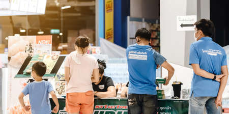 KANCHANABURI/ THAILAND - APRIL 18,2020 : Unidentified people order pizza to take home inside of Robinson closes due to the corona virus (Covid-19) outbreak but opens only food section at Robinson Department Store.のeditorial素材