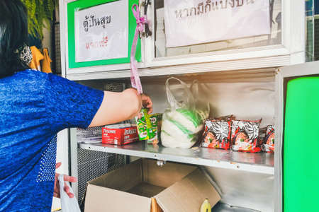 KANCHANABURI, THAILAND-MAY 15,2020: "THE PANTRY OF SHARING" Donation food pantry box or cupboard donate due to Coronavirus (COVID-19) crisis,Sharing campaign for Thai people at Tha Muang district.のeditorial素材