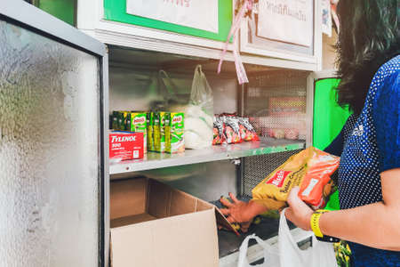 KANCHANABURI, THAILAND-MAY 15,2020: "THE PANTRY OF SHARING" Donation food pantry box or cupboard donate due to Coronavirus (COVID-19) crisis,Sharing campaign for Thai people at Tha Muang district.のeditorial素材