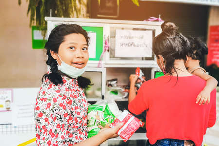 KANCHANABURI, THAILAND-MAY 15,2020: "THE PANTRY OF SHARING" Donation food pantry box or cupboard donate due to Coronavirus (COVID-19) crisis,Sharing campaign for Thai people at Tha Muang district.のeditorial素材